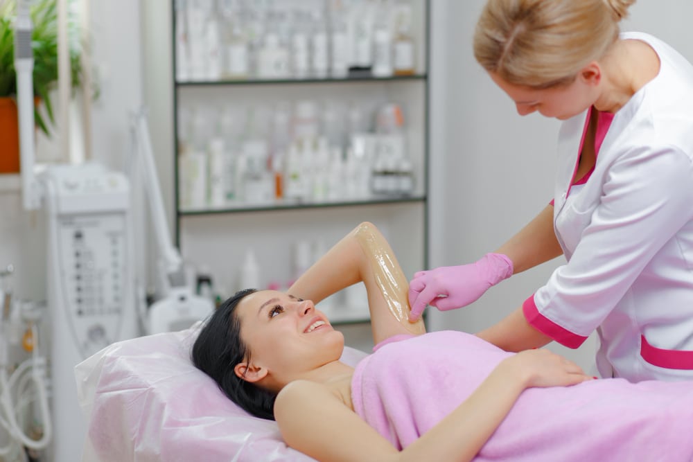 Laser hair removal device targeting leg hair in a professional clinic