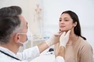 Before and after Kybella injections for double chin fat removal